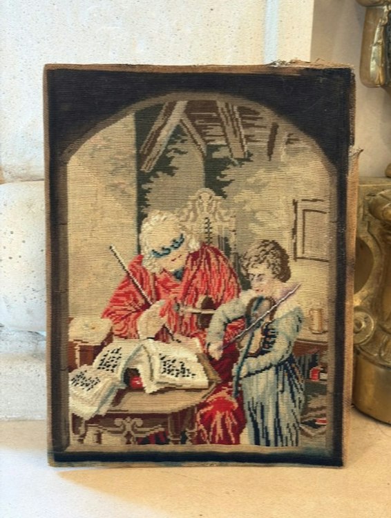 Continental wool needlepoint panel depicting 'The Violin Lesson'